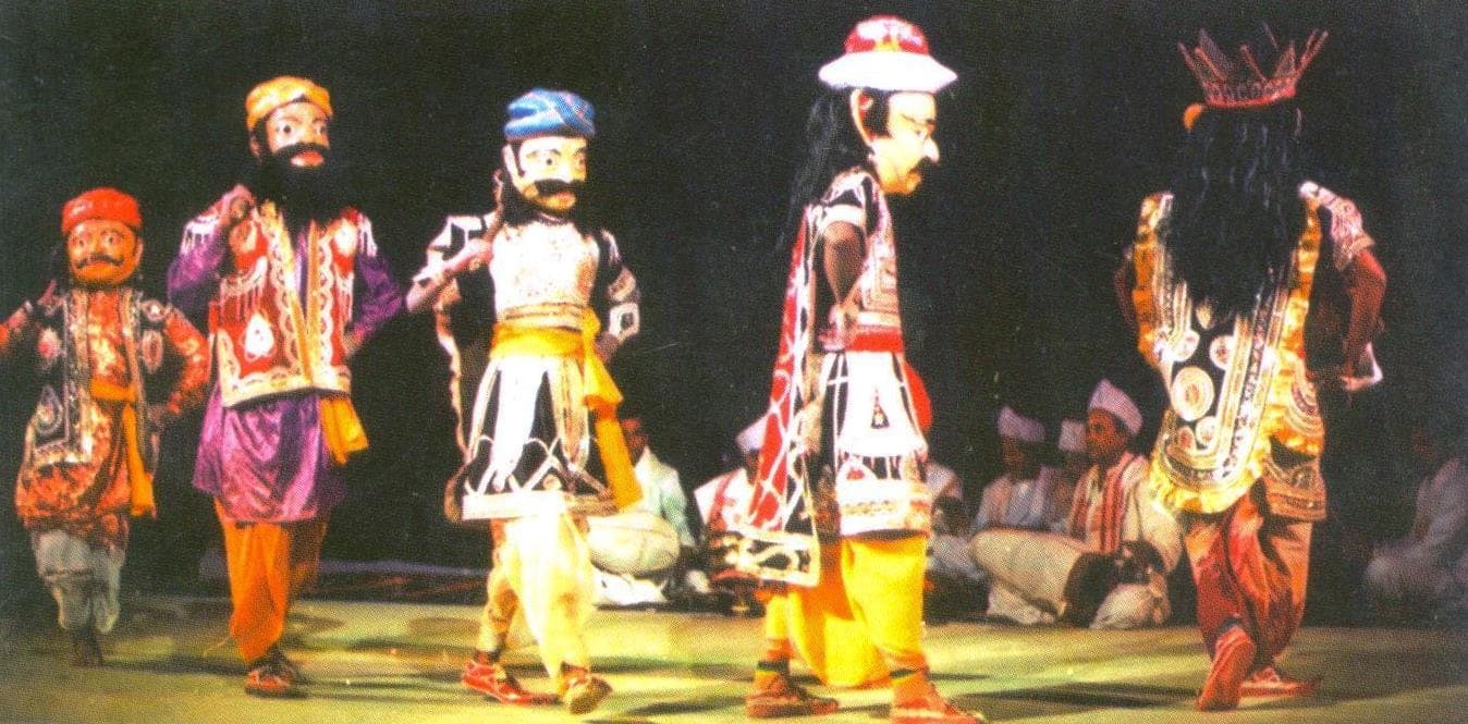 Bhaona performance wearing masks